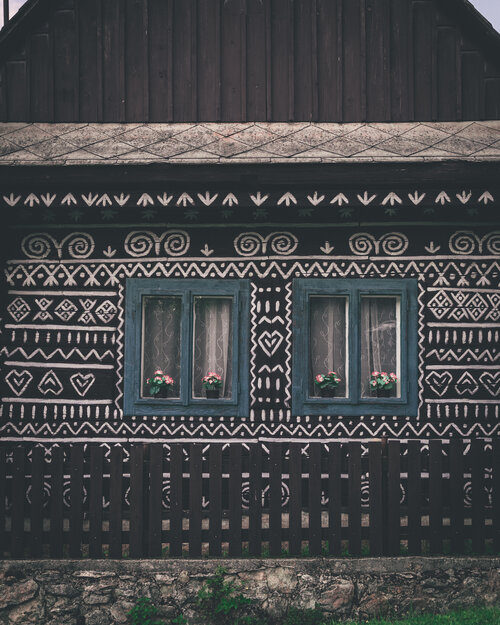 Traditional Cicmany house covered in white patterns