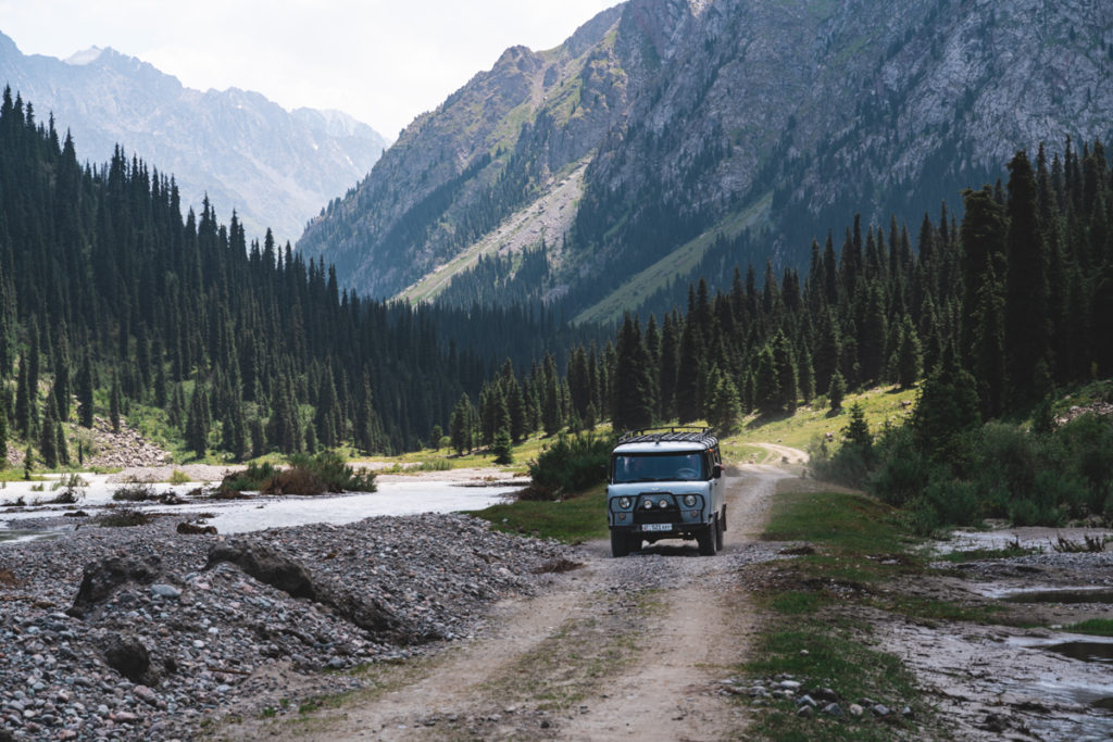 Minivan transporting tourists in Karakol NP.